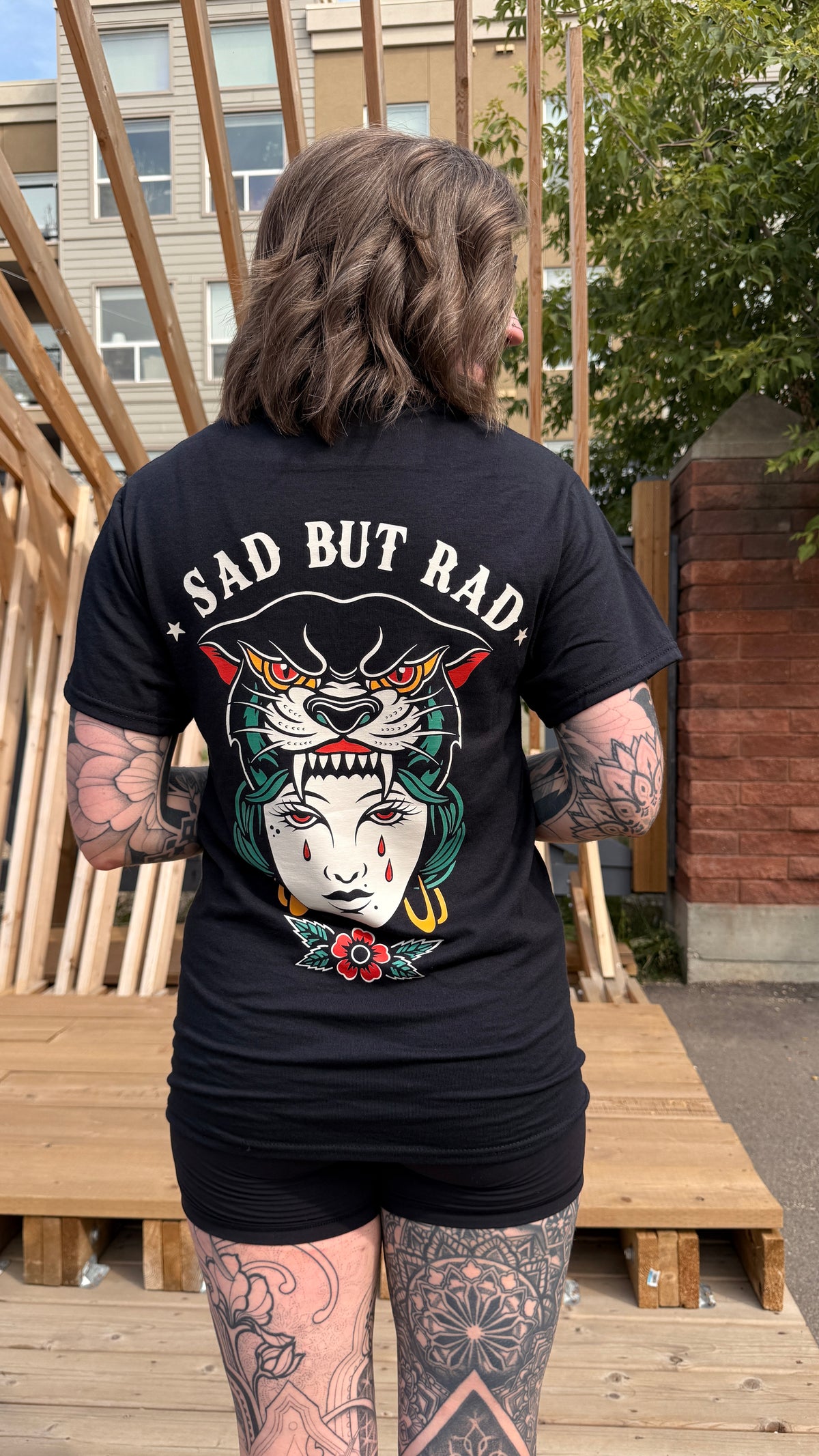 Sad But Rad tattoo-inspired graphic T-shirt lifestyle view by HappyHouse Apparel