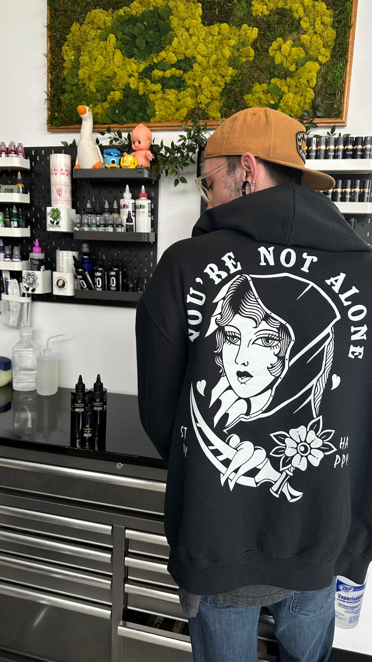 Not Alone graphic pullover hoodie lifestyle photo by HappyHouse Apparel