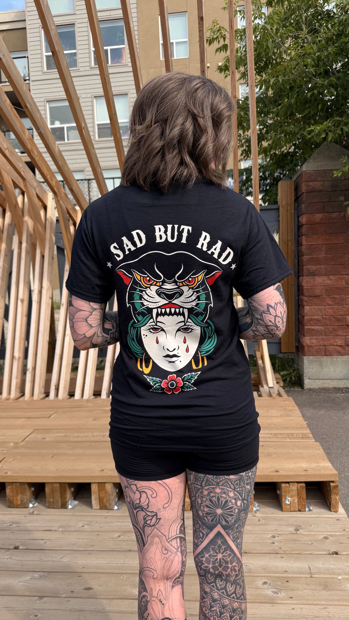 Sad But Rad graphic T-shirt lifestyle photo by HappyHouse Apparel
