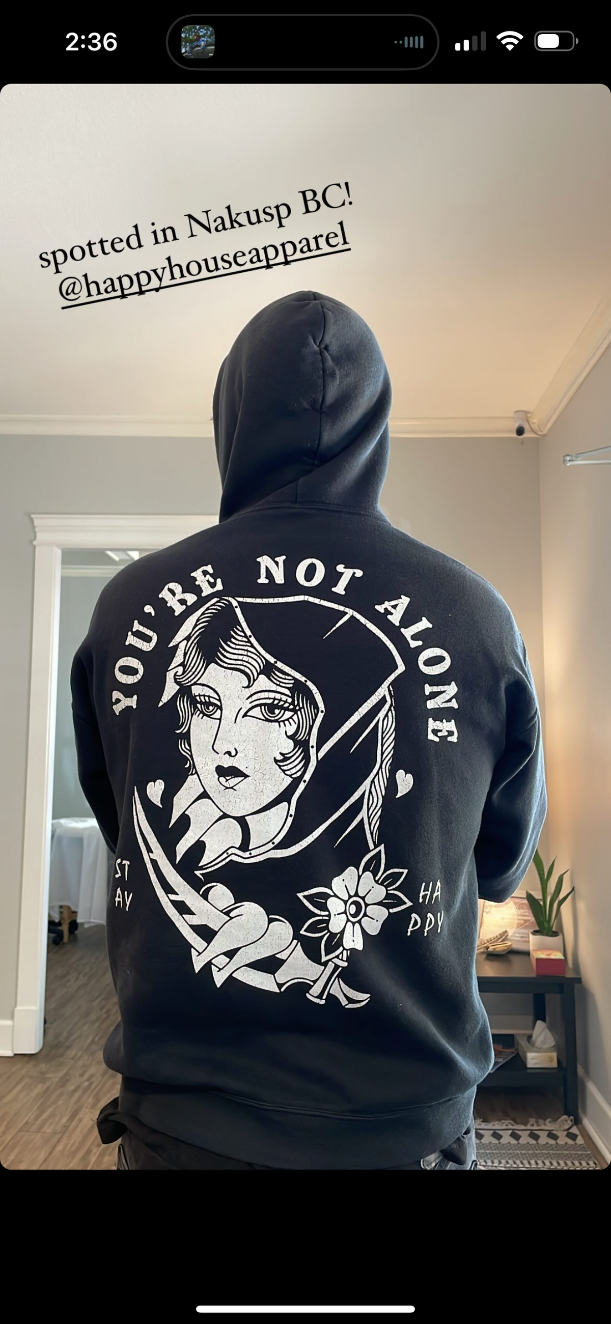 Not Alone graphic pullover hoodie lifestyle view by HappyHouse Apparel
