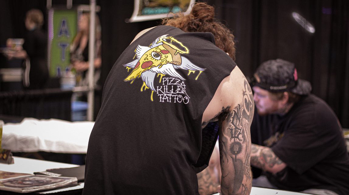 Pizza Killer graphic T-shirt lifestyle view by HappyHouse Apparel